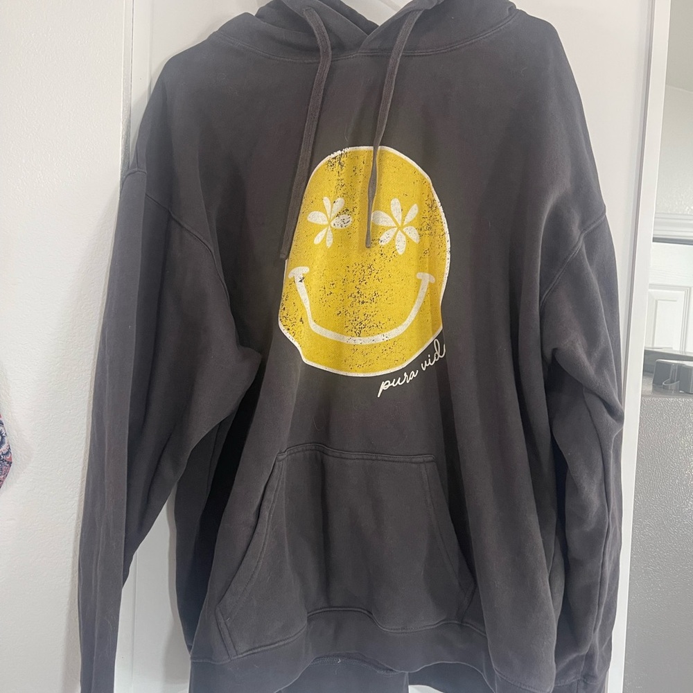 Black Hoodie with Yellow Smiley Pura Vida